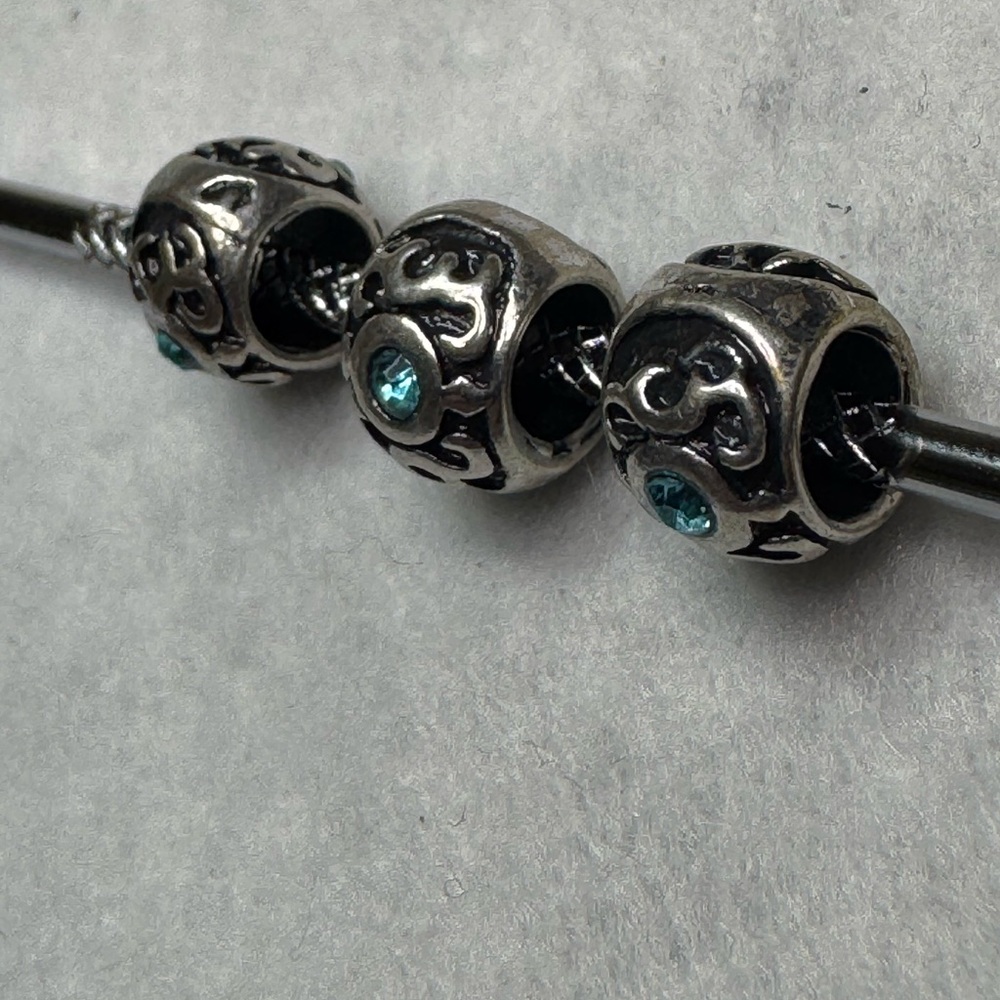 5/$20 single metal Charm Bead